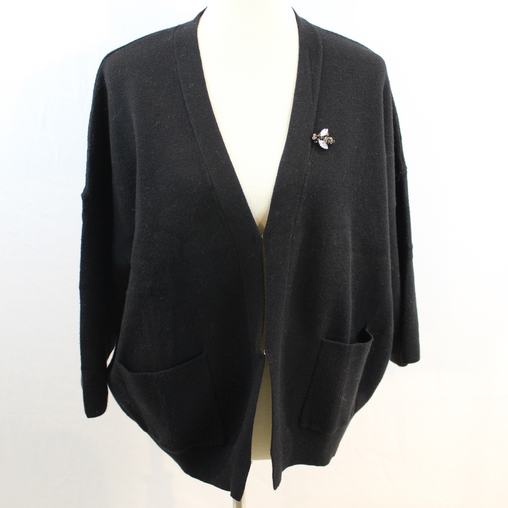 black cardigan with bee detail